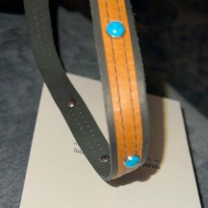 Tan wrap bracelet with turquoise bracelet